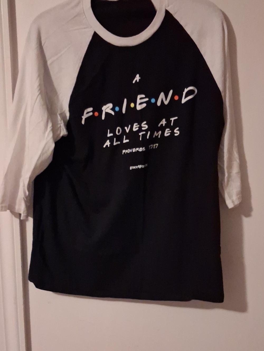 Black & White Raglan Kids Tee with 'A Friend Loves At All Times' Graphic